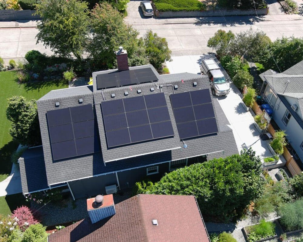 Aerial view of a completed rooftop solar array